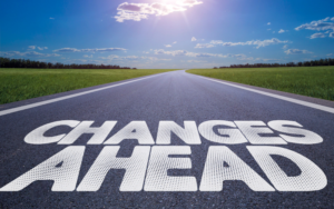 change ahead words on open road into the blue sky